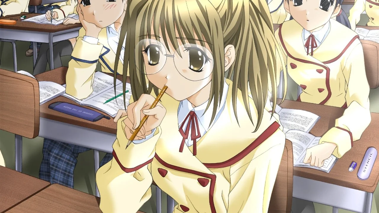 眼鏡をかけ鉛筆をくわえて勉強する女子生徒
